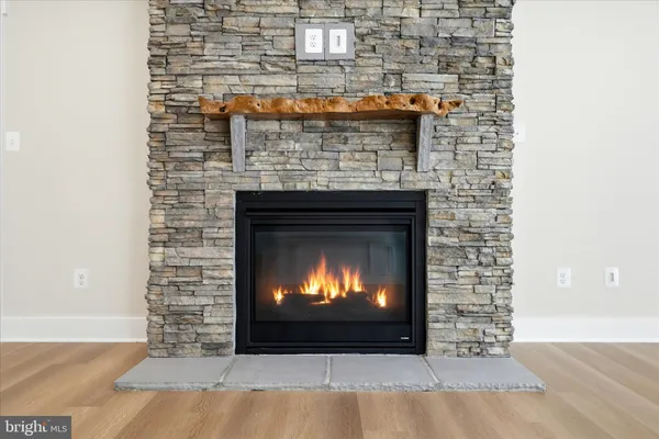 a room with fireplace and a fireplace