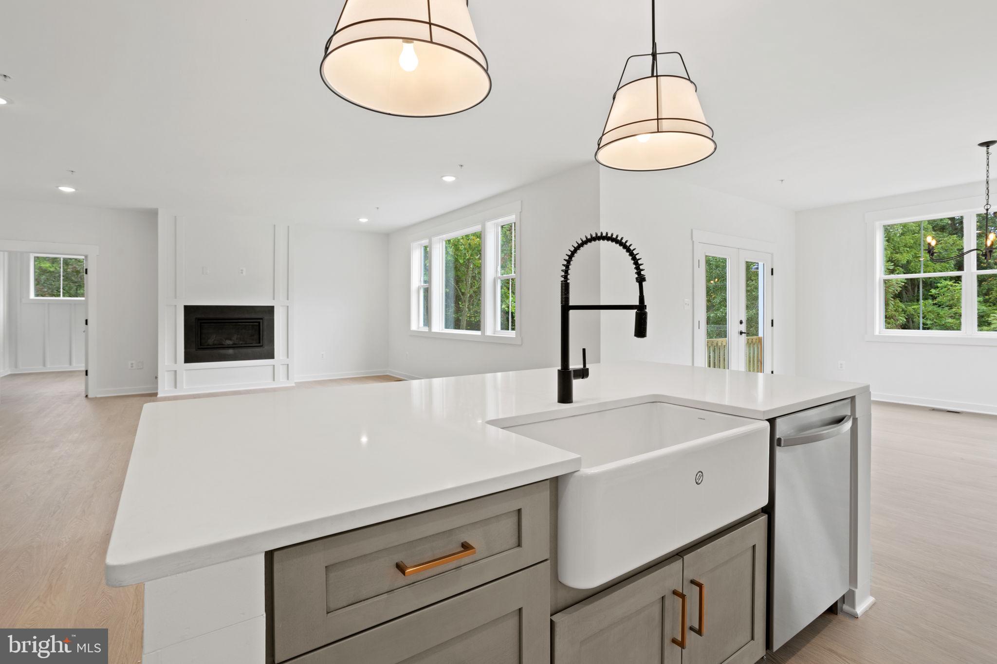 640 Grim Road Stephens City, VA 22655 - Photo 16 of 50 a kitchen with a sink cabinets and a window