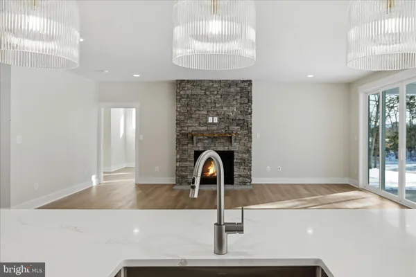a kitchen with a sink and a window