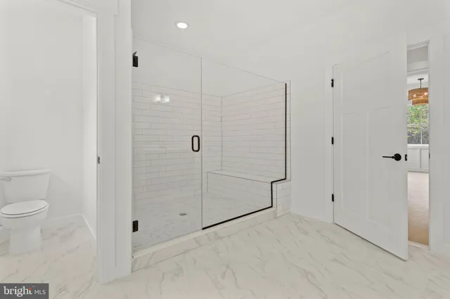 a view of a room with a hallway