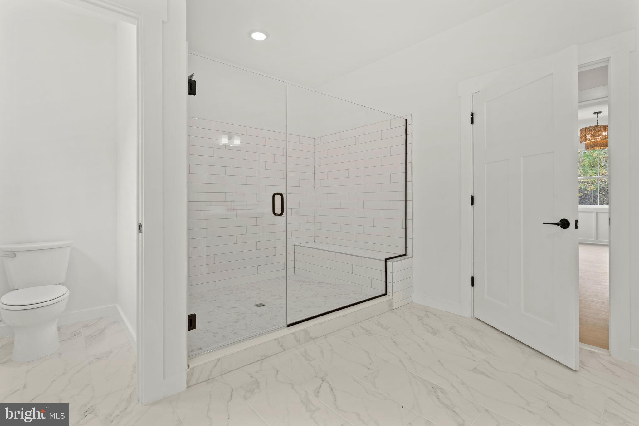 640 Grim Road Stephens City, VA 22655 - Photo 28 of 50 a bathroom with a shower and a toilet