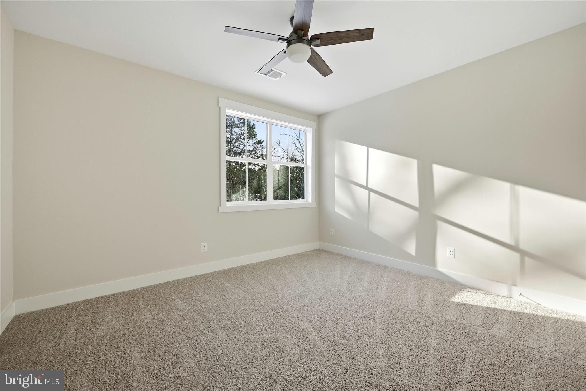640 Grim Road Stephens City, VA 22655 - Photo 36 of 50 a view of an empty room with a window