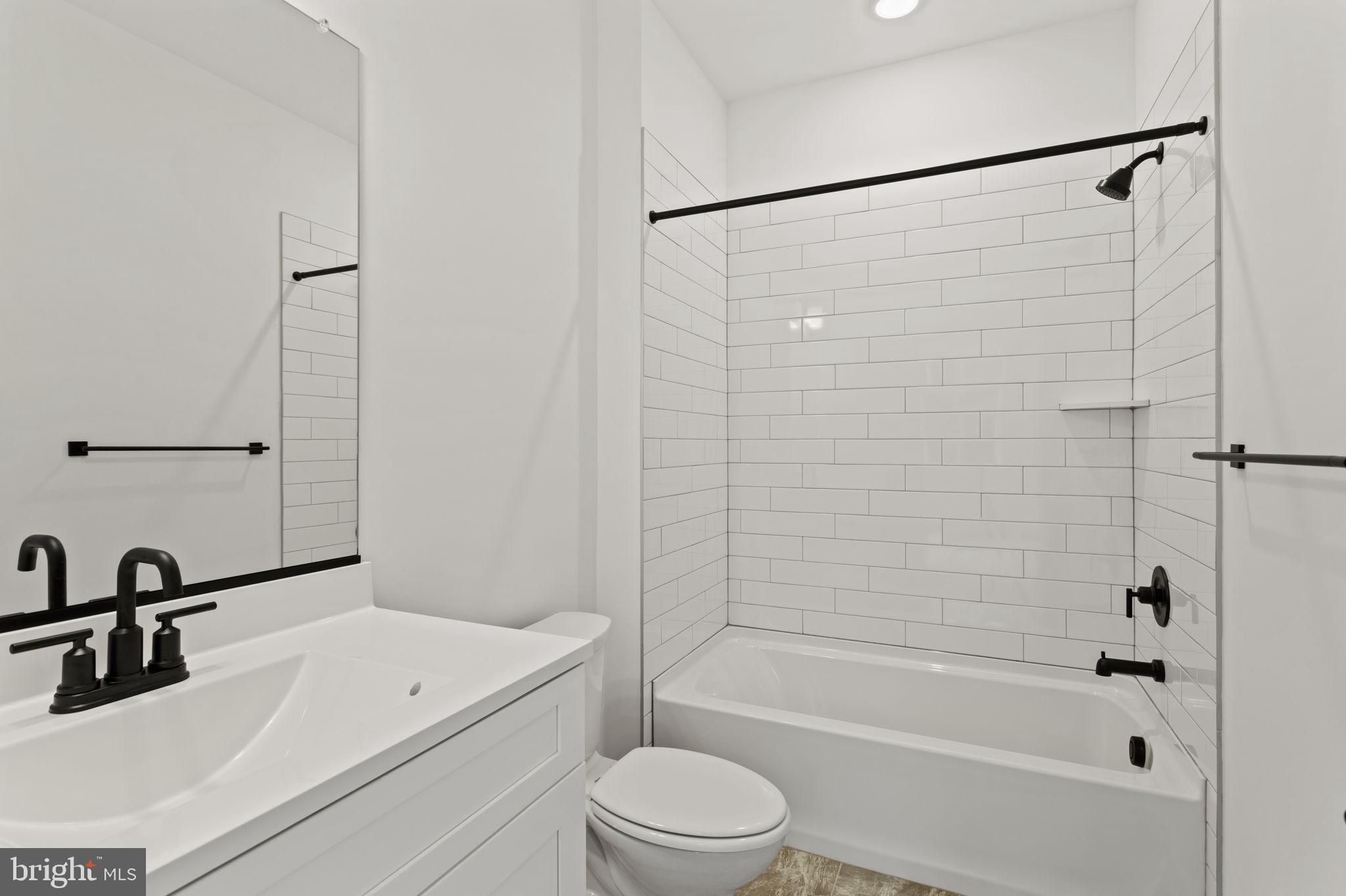 640 Grim Road Stephens City, VA 22655 - Photo 41 of 50 a bathroom with a sink toilet and shower