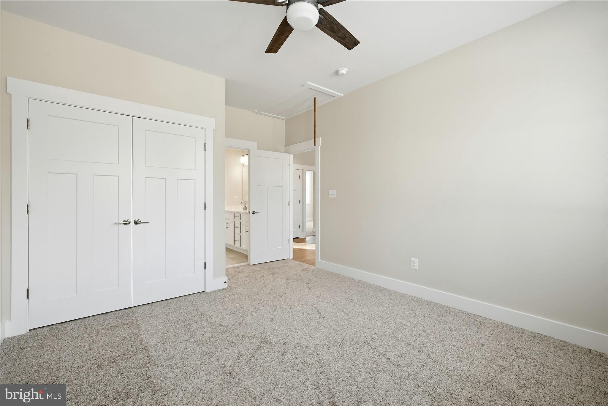640 Grim Road Stephens City, VA 22655 - Photo 43 of 50 an empty room with chandelier fan and closet