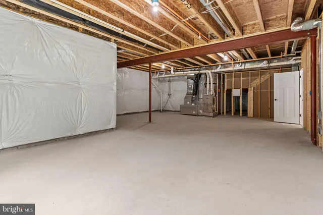 an aerial view of residential building and lake