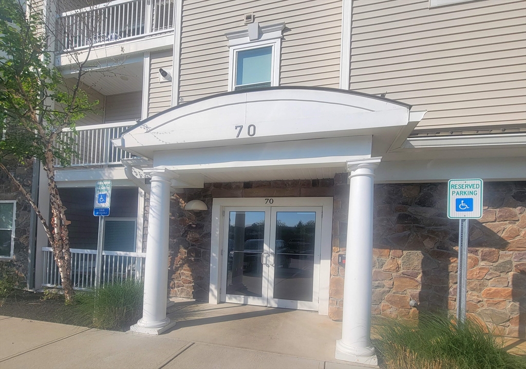 70 Trotter Road, Unit 312 Weymouth, MA 02190 - Photo 2 of 18 a front view of a house with a shower