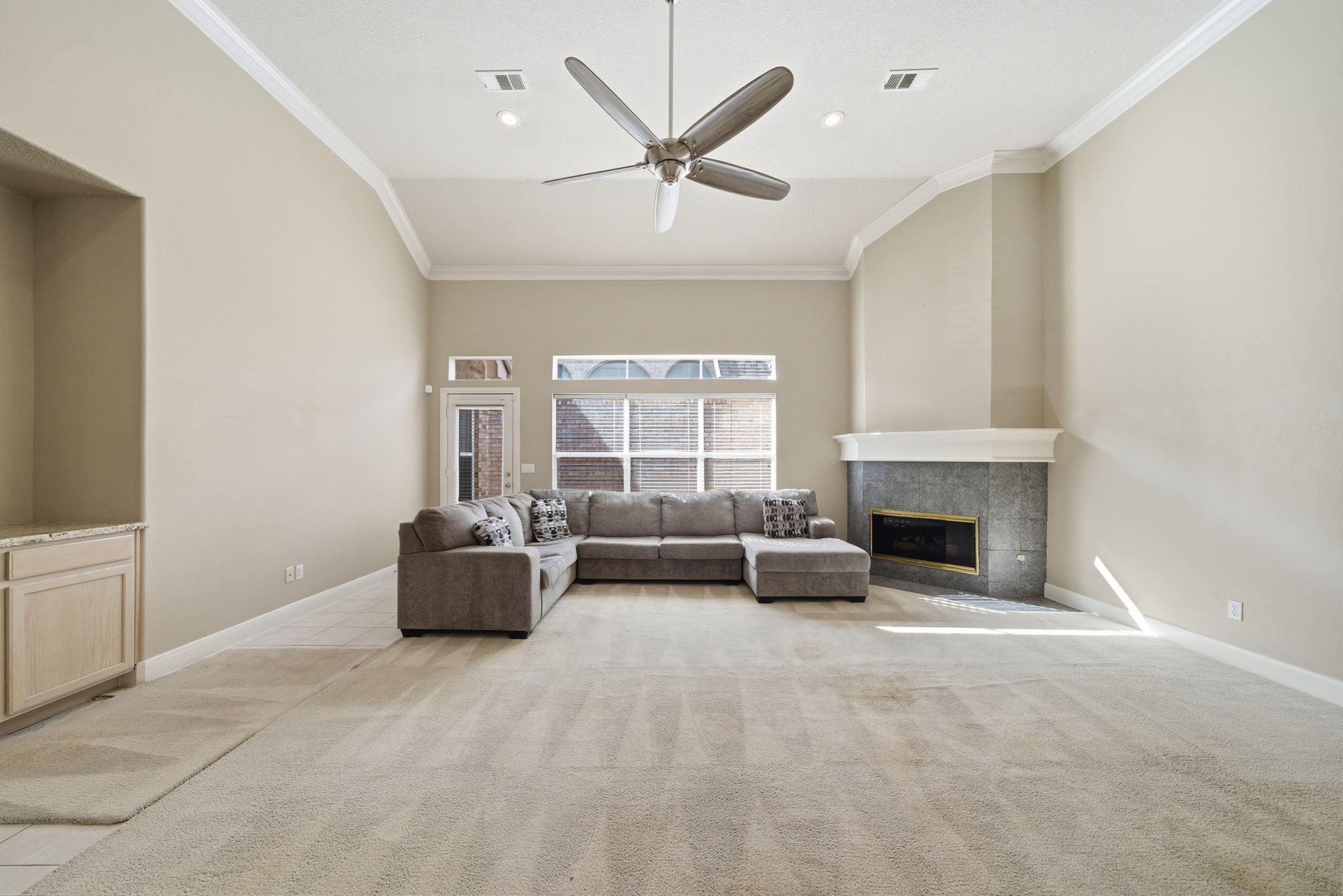 19803 Excalibur Court Houston, TX 77094 - Photo 16 of 34 a living room with furniture and a fireplace