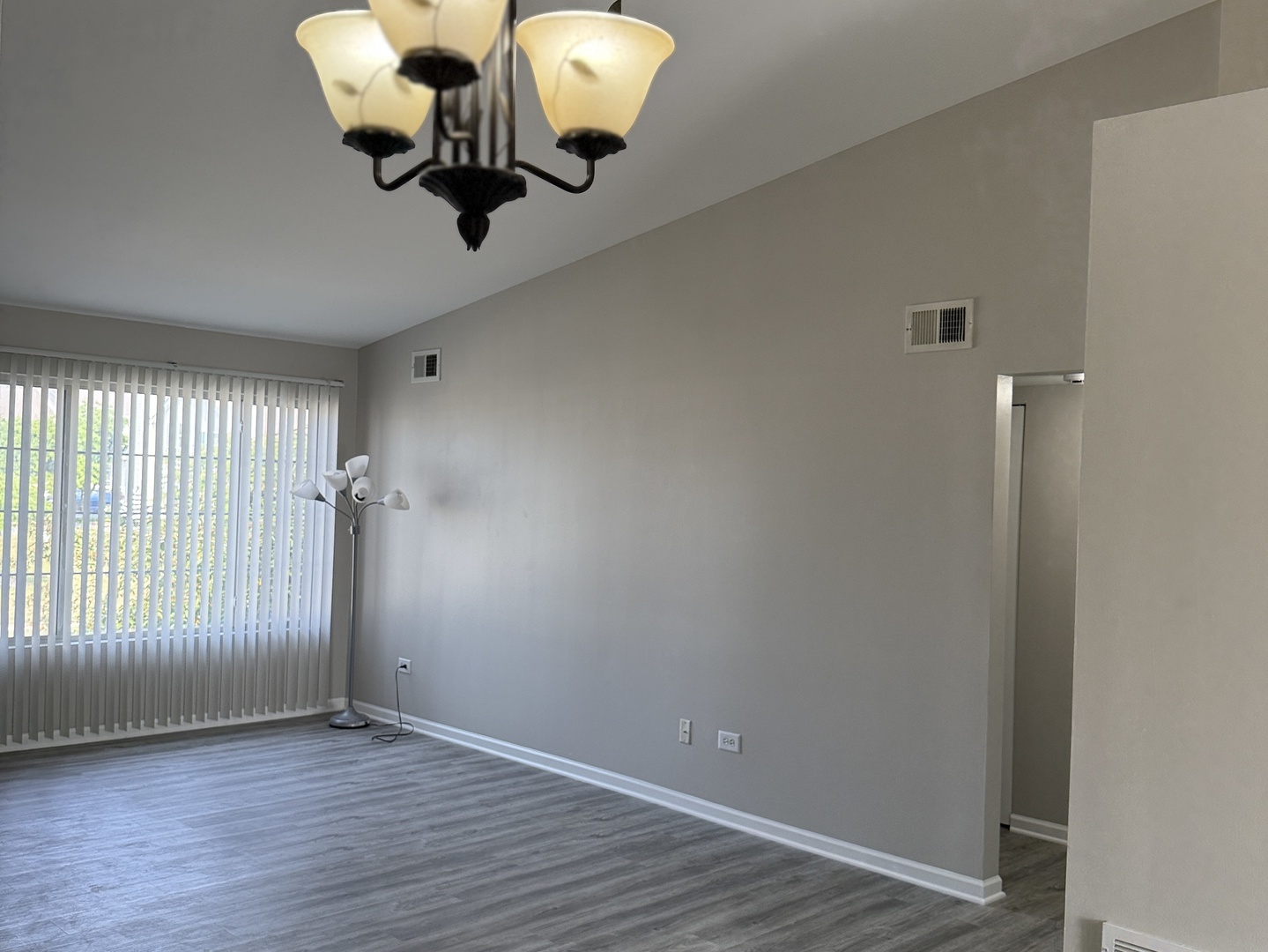 1411 Berta Drive, Unit 2N Crest Hill, IL 60403 - Photo 17 of 20 a view of a livingroom with wooden floor