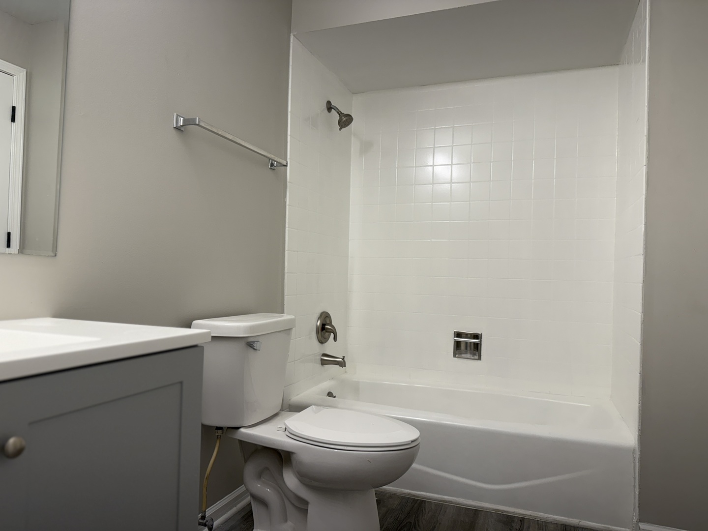 1411 Berta Drive, Unit 2N Crest Hill, IL 60403 - Photo 9 of 20 a bathroom with a sink a toilet and shower