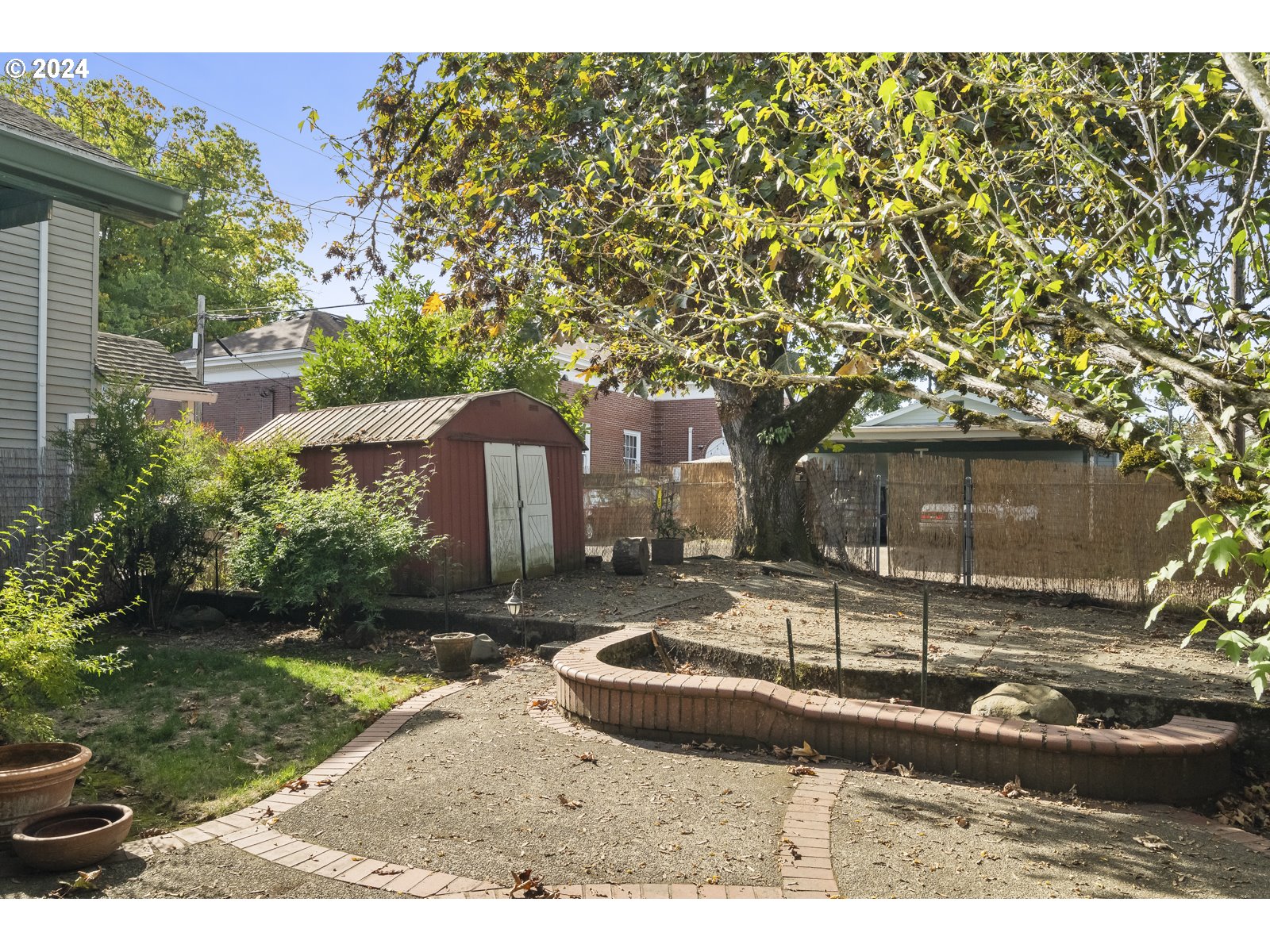4417 Southeast 65th Avenue Portland, OR 97206 - Photo 31 of 38 a front view of a house with garden