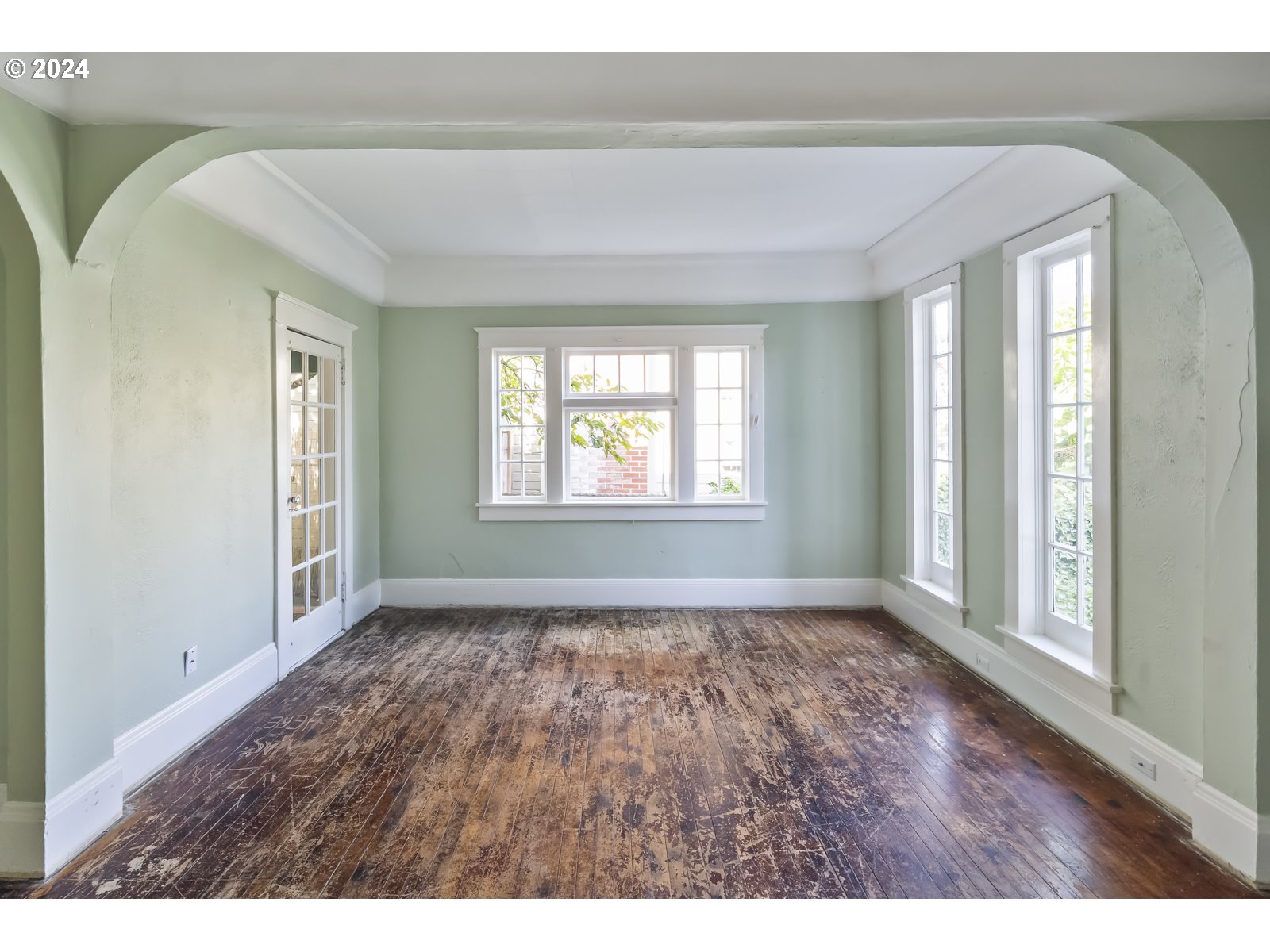 4417 Southeast 65th Avenue Portland, OR 97206 - Photo 5 of 38 a view of an empty room and window