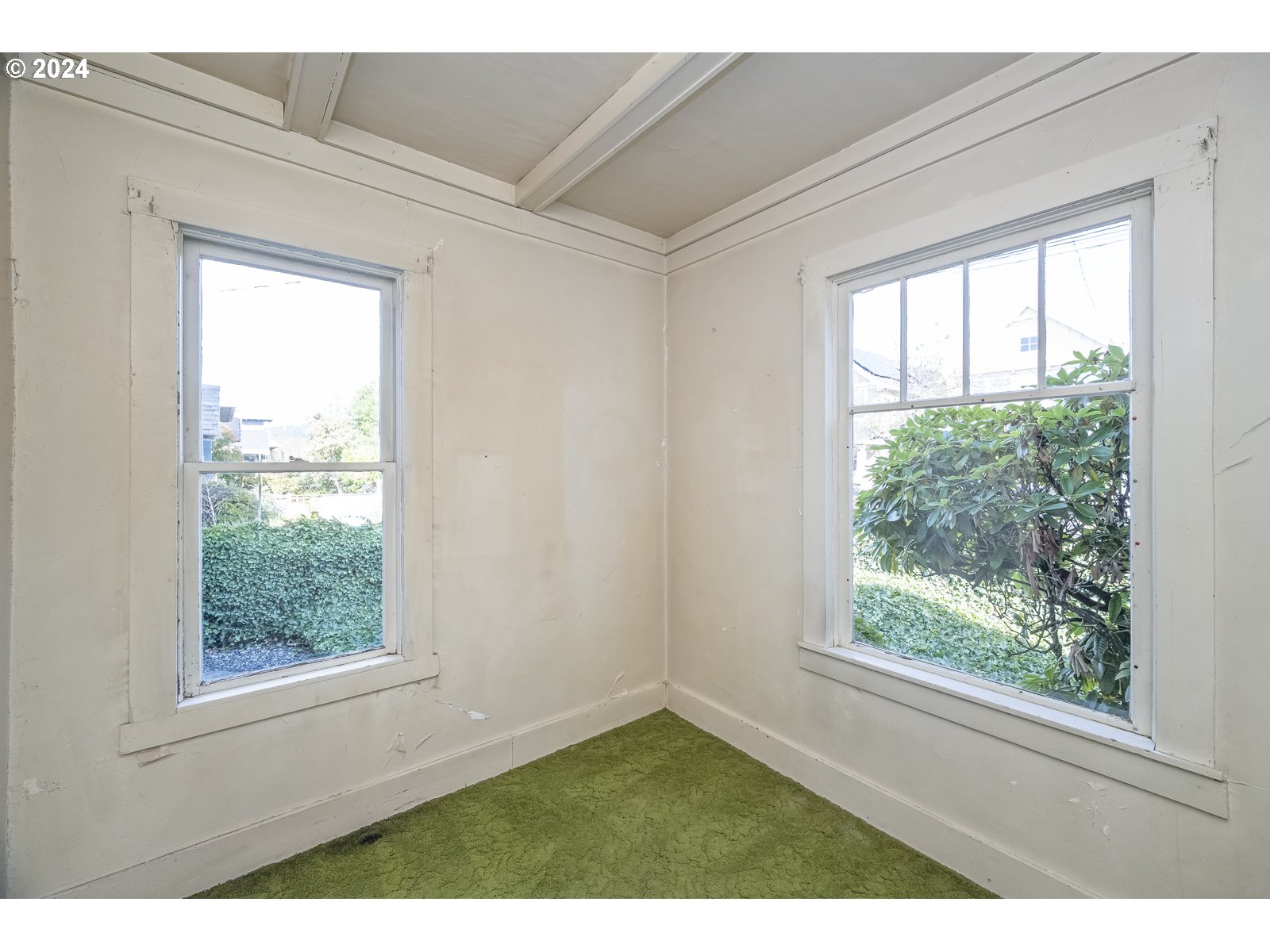 4417 Southeast 65th Avenue Portland, OR 97206 - Photo 10 of 38 a view of an empty room and window