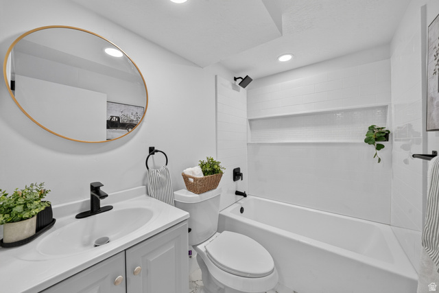 546 West 200 South Payson, UT 84651 - Photo 11 of 45 Bathroom featuring a white vanity with gray cabinetry, a rectangular undermount sink, and a matte black faucet