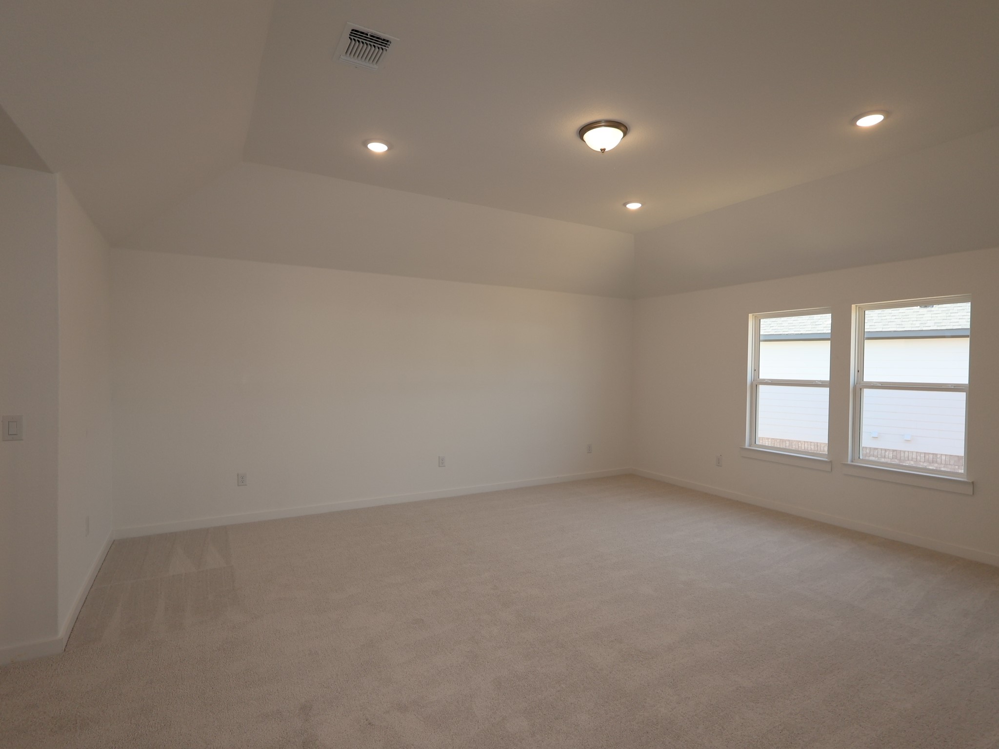 3977 Waco Way Leander, TX 78641 - Photo 11 of 23 an empty room with a empty space and windows