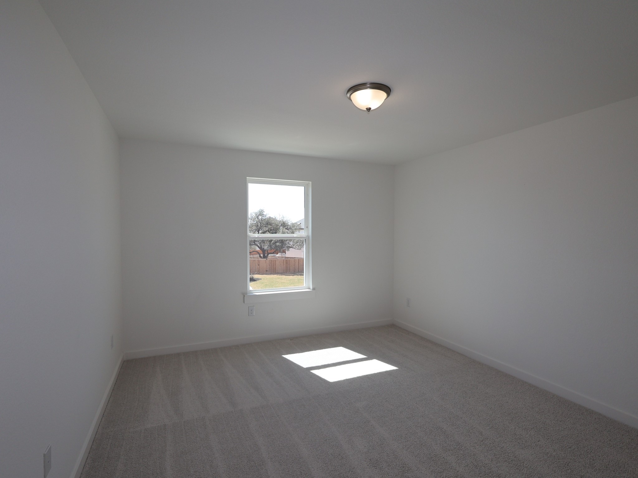 3977 Waco Way Leander, TX 78641 - Photo 14 of 23 an empty room with a empty space and a window