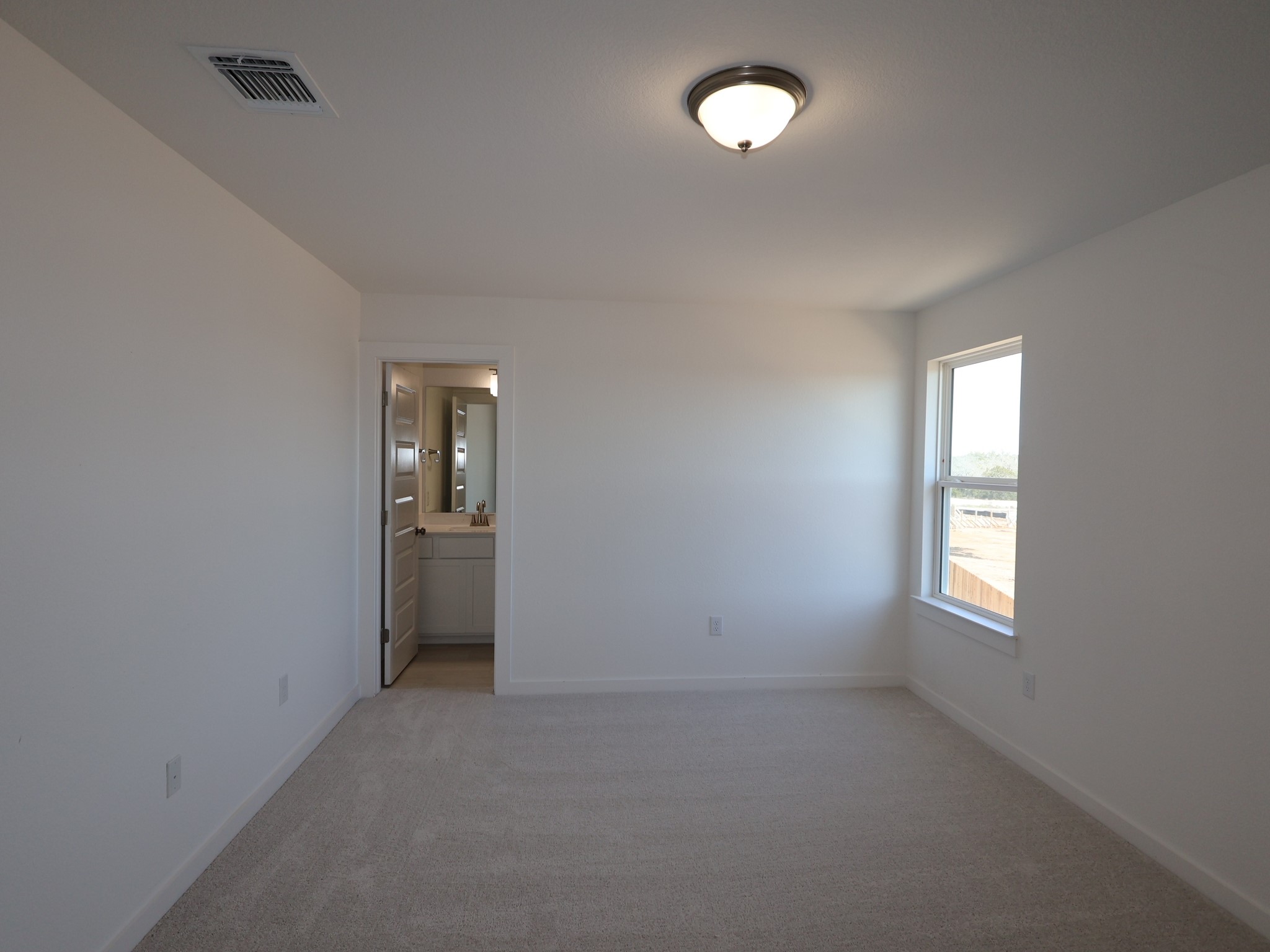 3977 Waco Way Leander, TX 78641 - Photo 17 of 23 an empty room with windows and closet