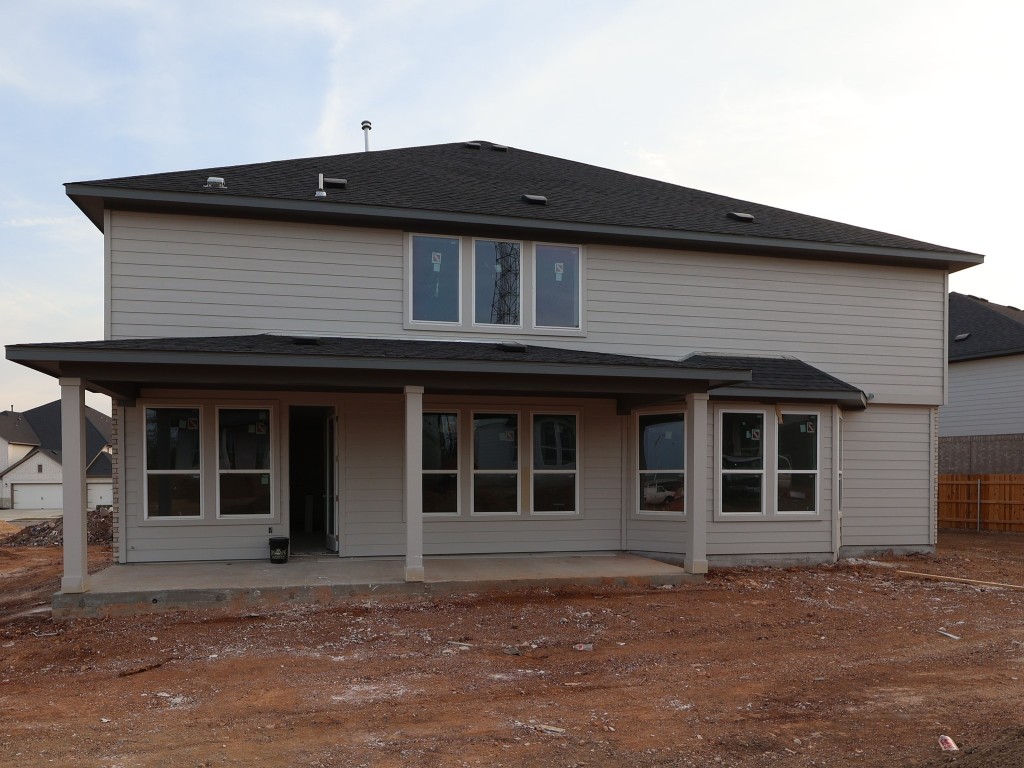 3977 Waco Way Leander, TX 78641 - Photo 7 of 11 a black and white building with a view of front door