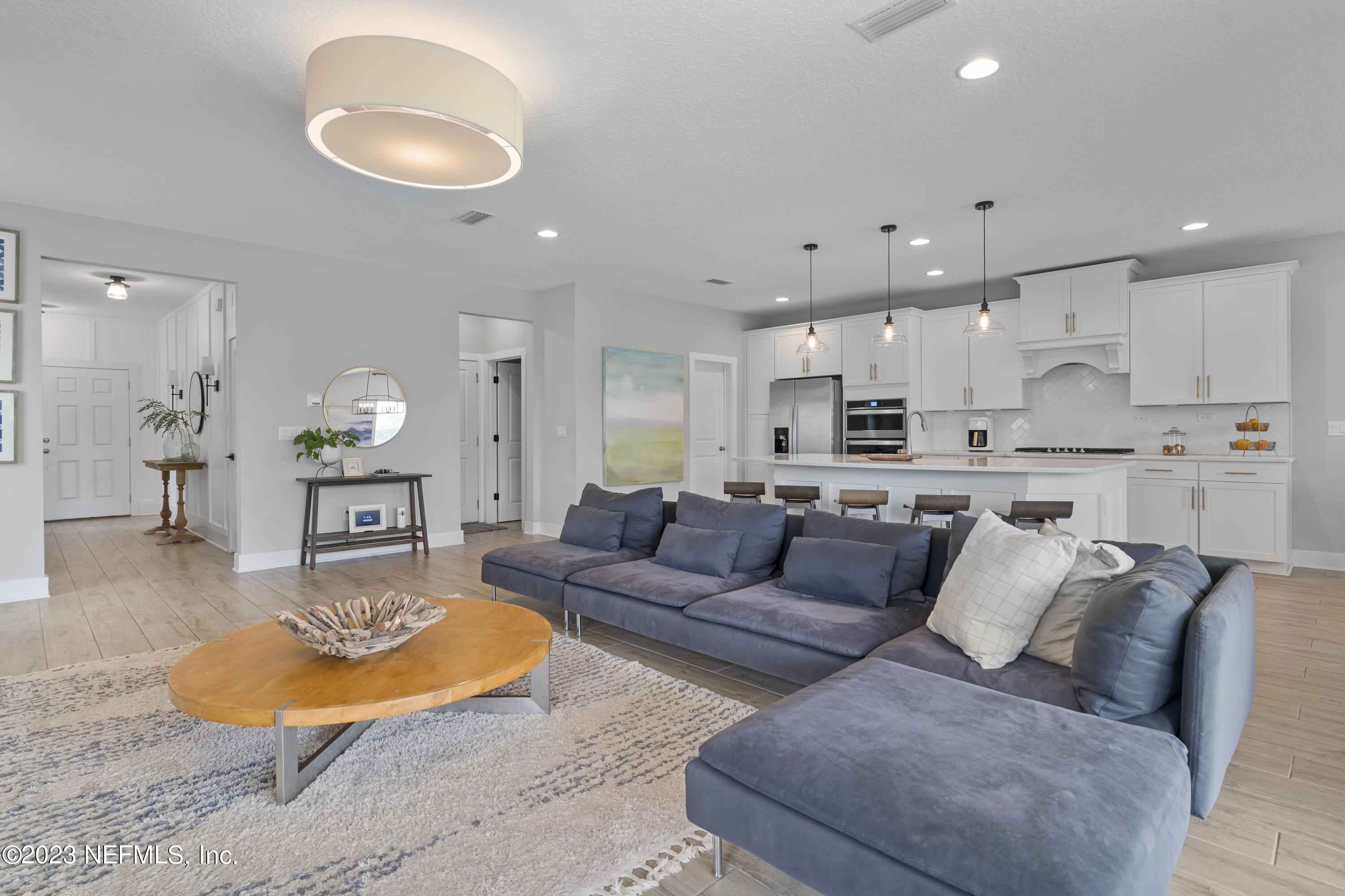 36 Strobe Court St. Augustine, FL 32095 - Photo 11 of 47 a living room with furniture and kitchen view