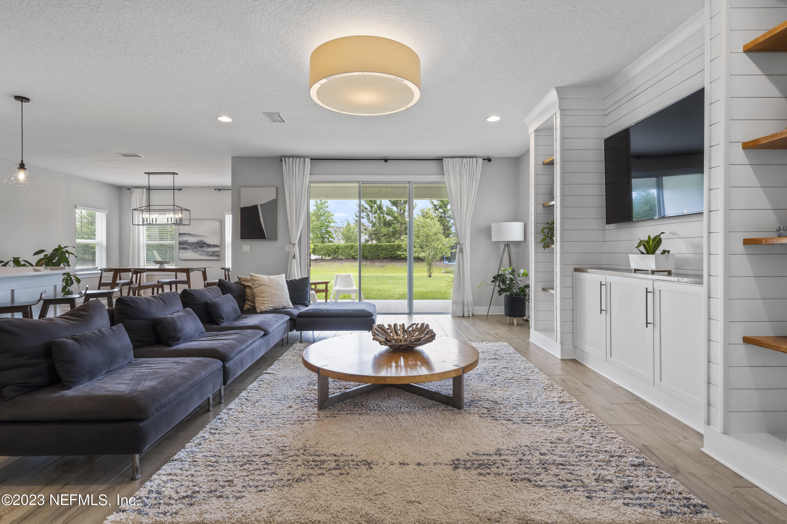 36 Strobe Court St. Augustine, FL 32095 - Photo 12 of 47 a living room with furniture and a large window