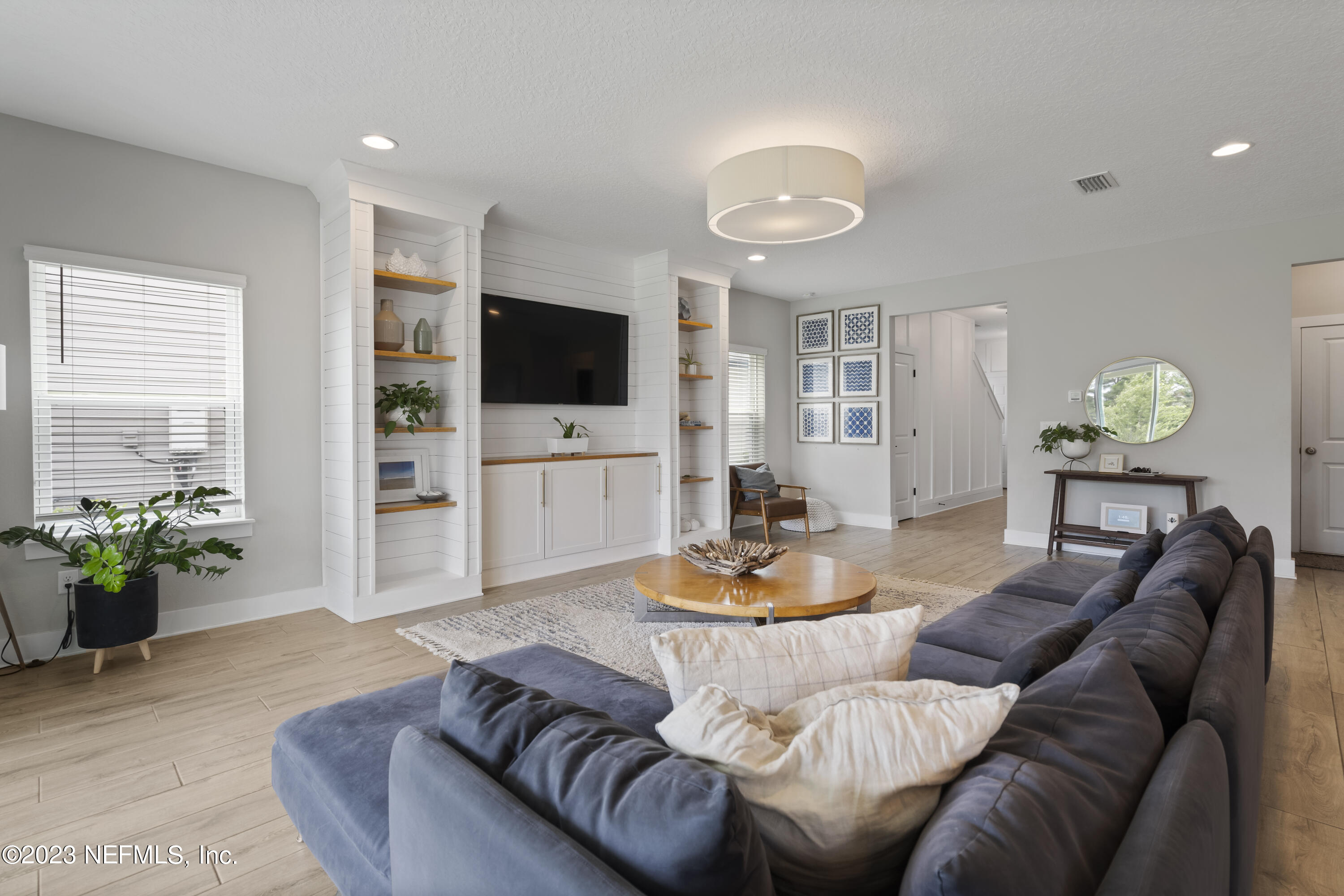 36 Strobe Court St. Augustine, FL 32095 - Photo 13 of 47 a living room with furniture and a flat screen tv