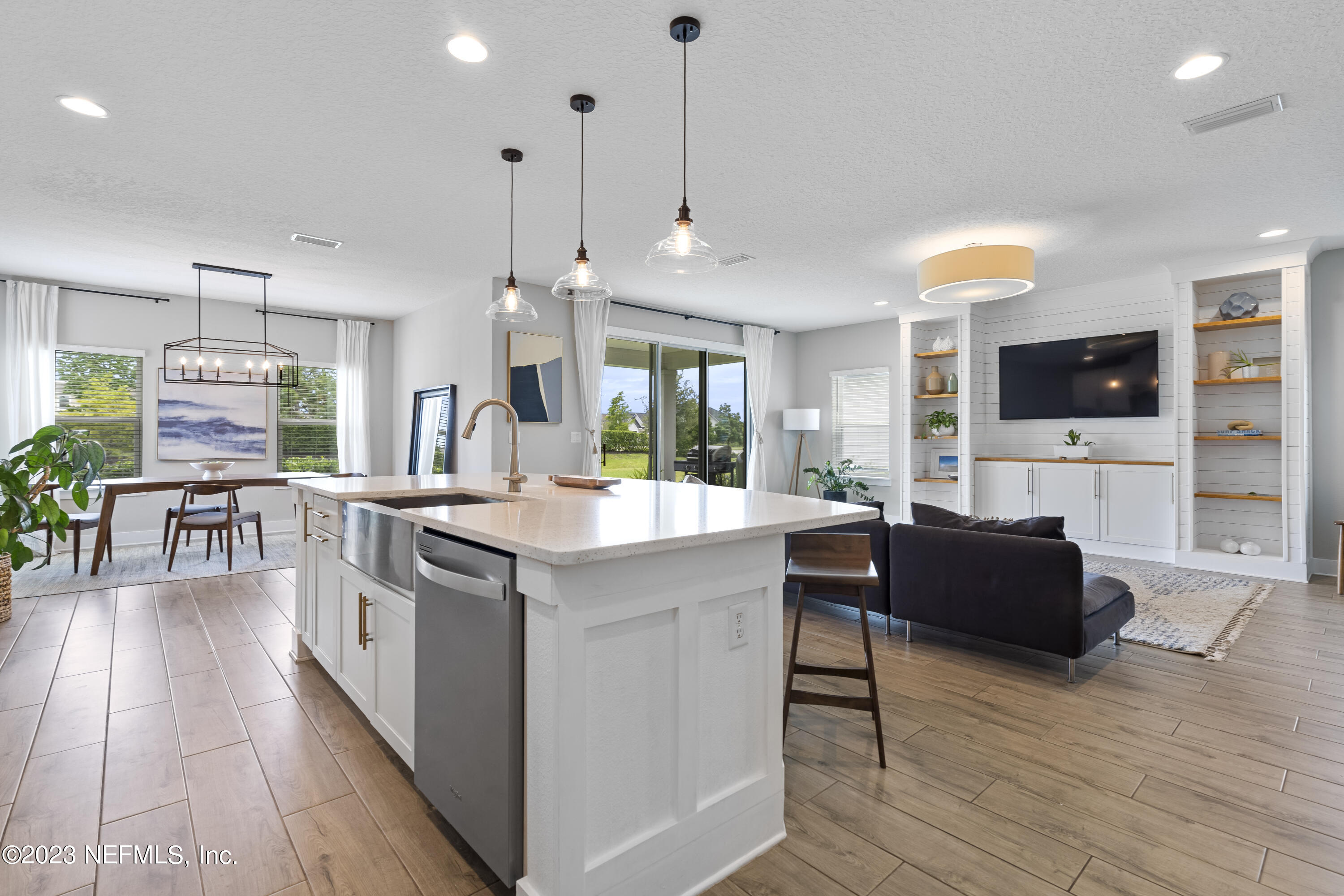 36 Strobe Court St. Augustine, FL 32095 - Photo 18 of 47 a kitchen with stainless steel appliances granite countertop a stove and a wooden floors