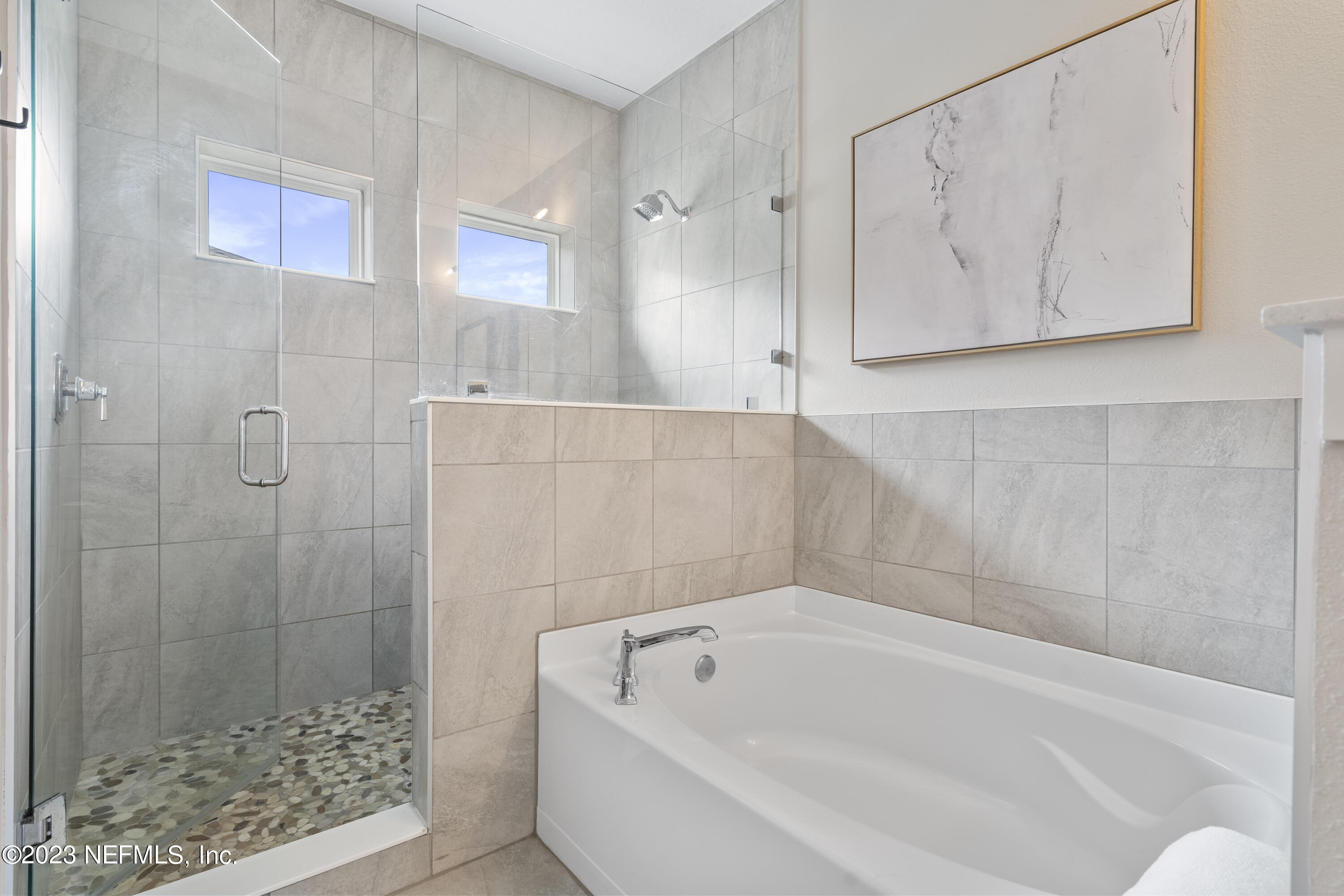 36 Strobe Court St. Augustine, FL 32095 - Photo 28 of 47 a bathroom with a bathtub and shower