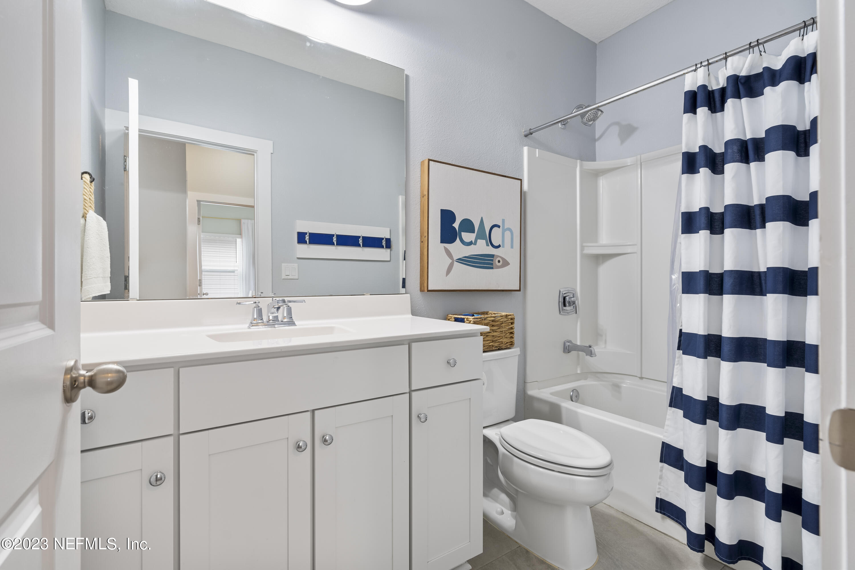 36 Strobe Court St. Augustine, FL 32095 - Photo 31 of 47 a bathroom with a sink a toilet a shower and a mirror