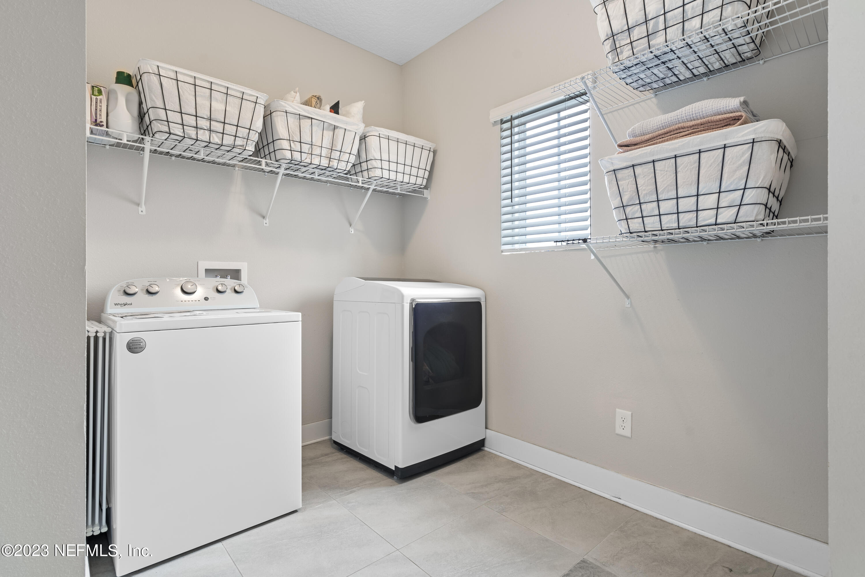 36 Strobe Court St. Augustine, FL 32095 - Photo 34 of 47 a utility room with dryer and washer