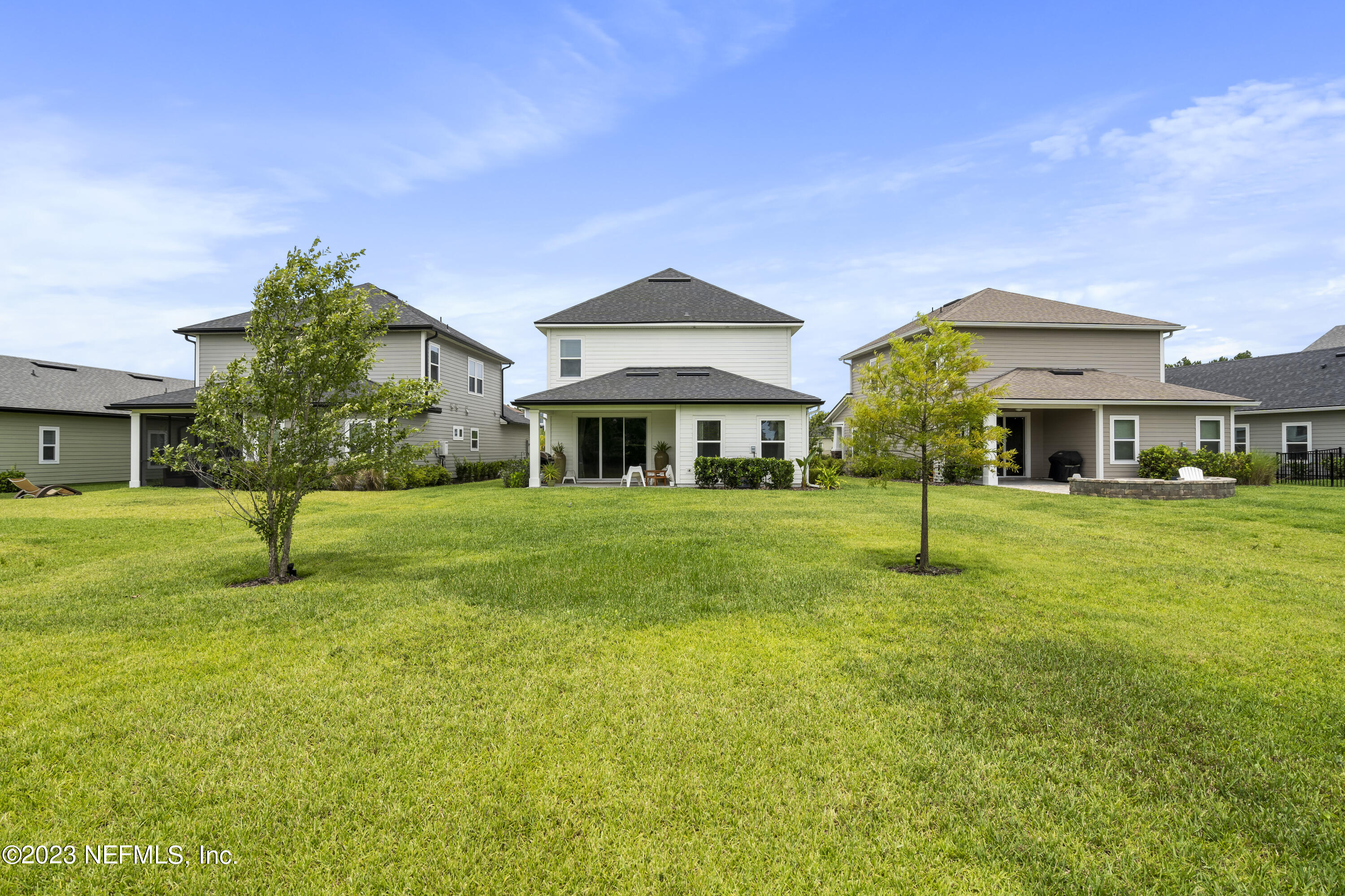 36 Strobe Court St. Augustine, FL 32095 - Photo 36 of 47 a front view of a house with a garden