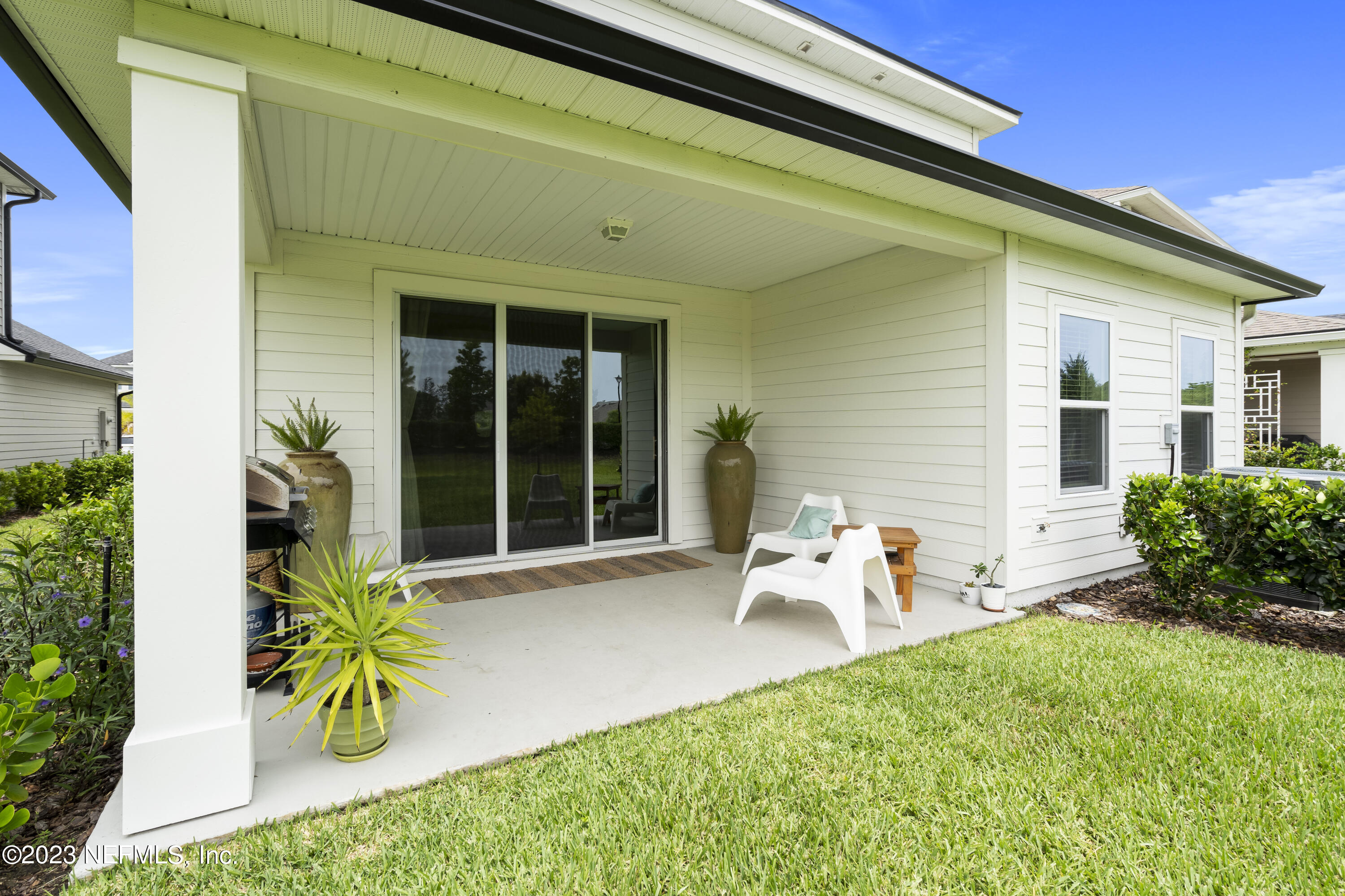36 Strobe Court St. Augustine, FL 32095 - Photo 38 of 47 a view of a house with backyard and sitting area
