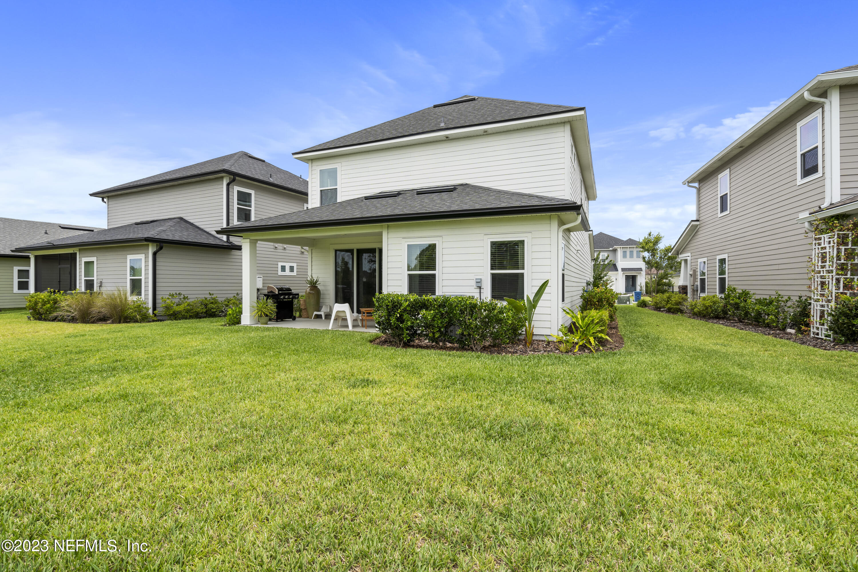36 Strobe Court St. Augustine, FL 32095 - Photo 40 of 47 a front view of a house with a yard
