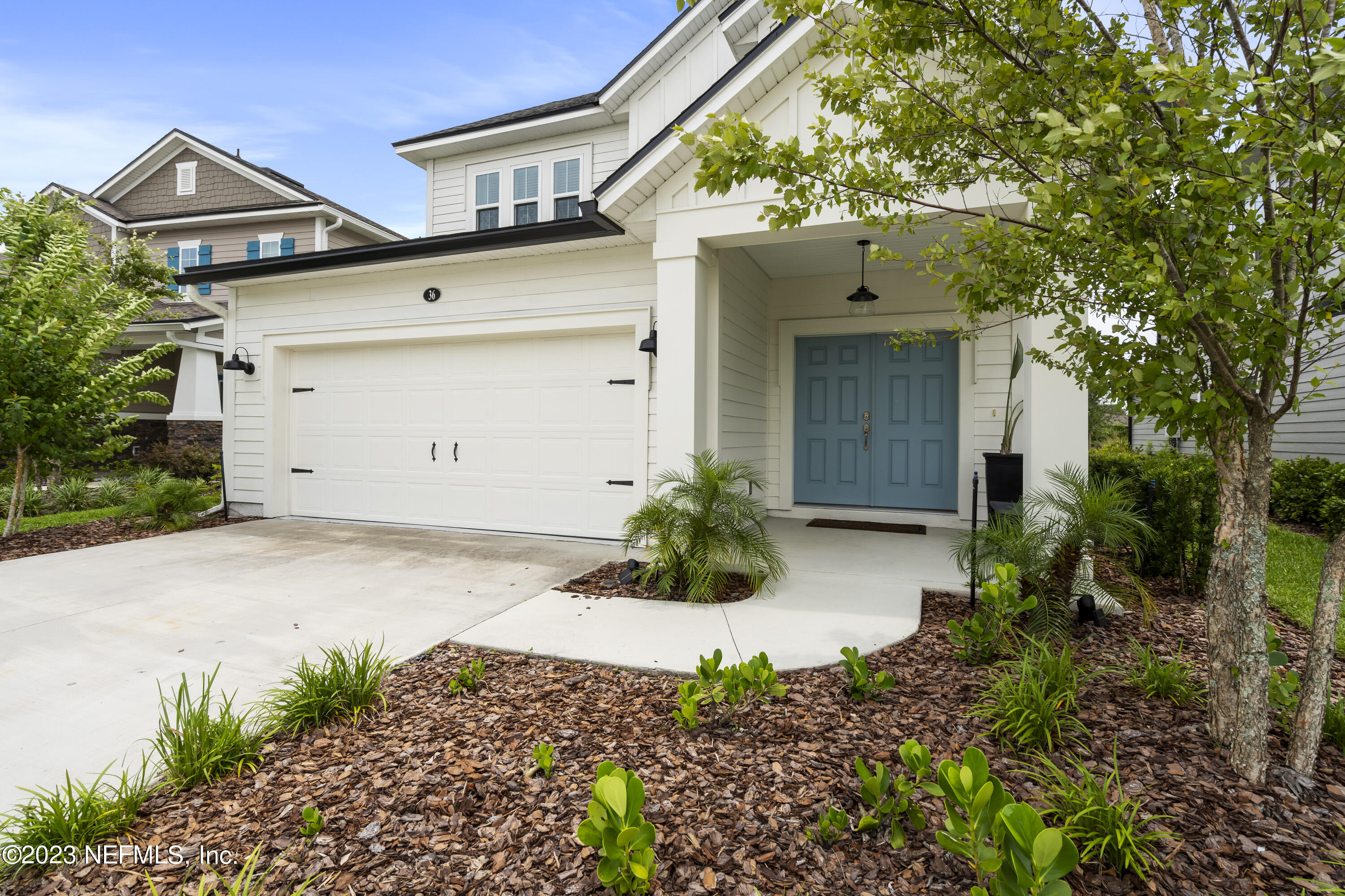 36 Strobe Court St. Augustine, FL 32095 - Photo 8 of 47 a front view of a house with a yard