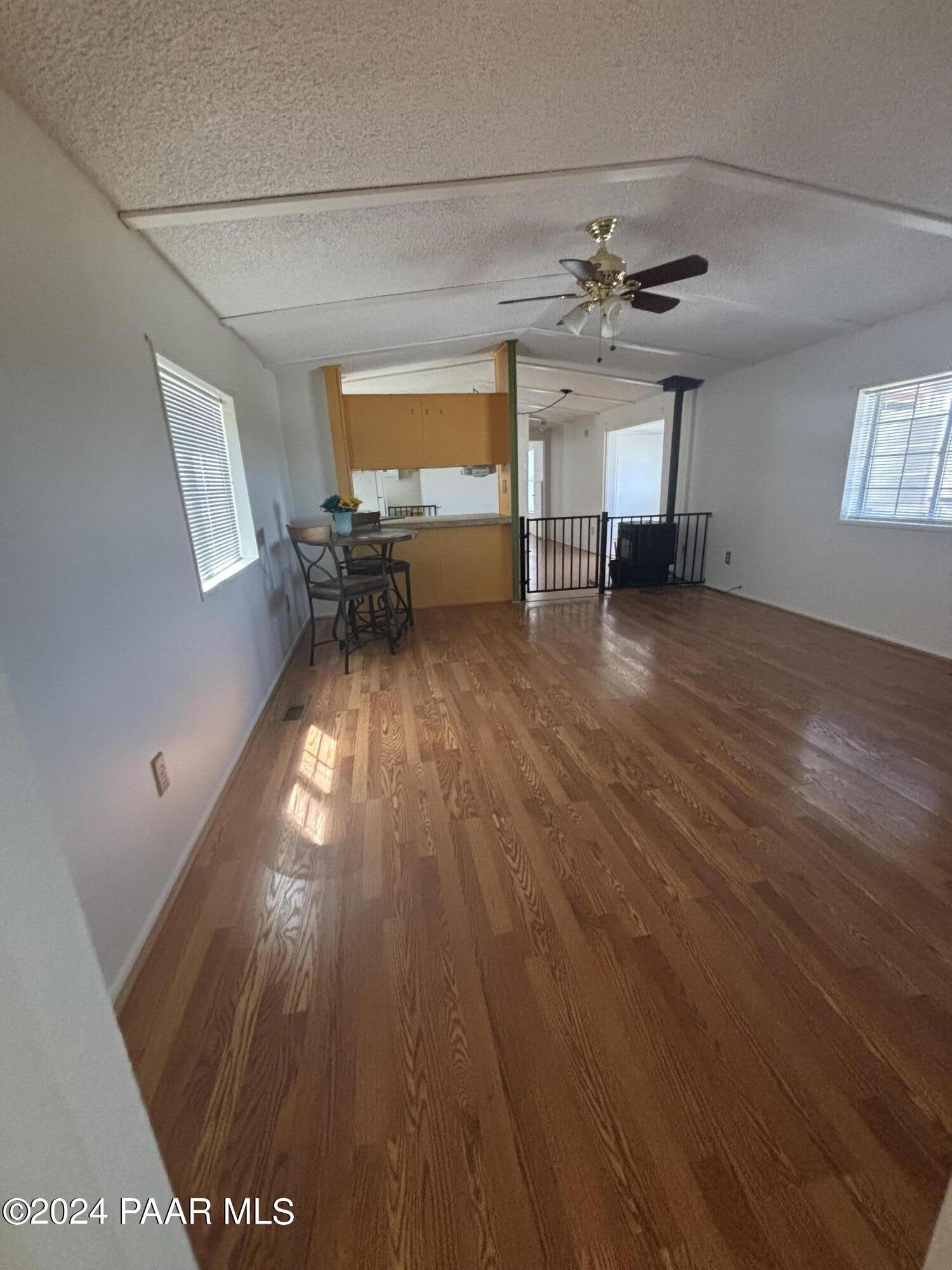2495 River Trail Road Prescott, AZ 86301 - Photo 5 of 14 LIVING ROOM TO KITCHEN VIEW