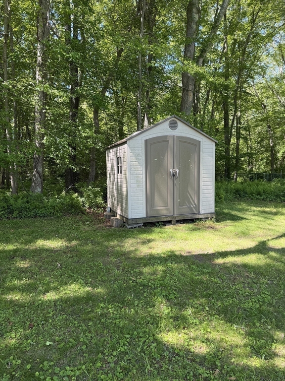 217-bb Tickle Road Westport, MA 02790 - Photo 23 of 24 a backyard of a house with lots of green space