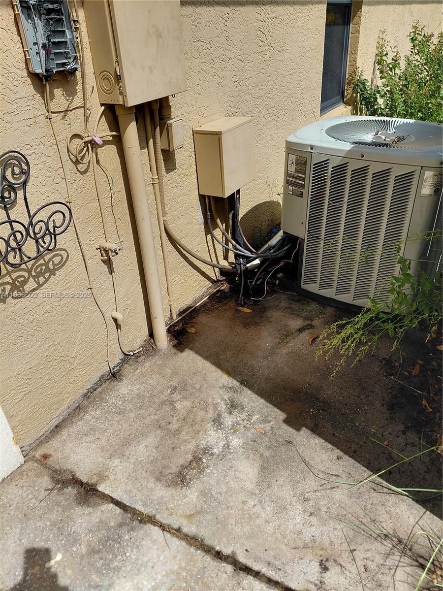 740 Arbuckle Creek Road Lorida, FL 33857 - Photo 11 of 21 a view of a backyard with a table and chair