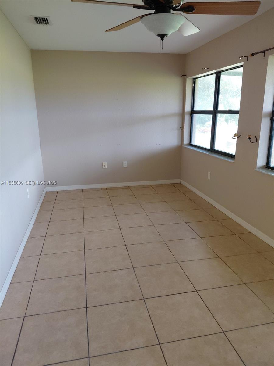 740 Arbuckle Creek Road Lorida, FL 33857 - Photo 9 of 21 a view of an empty room with a window