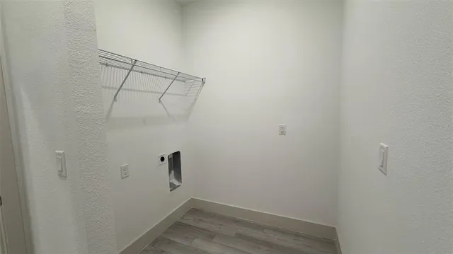 a view of a room with racks on the wall