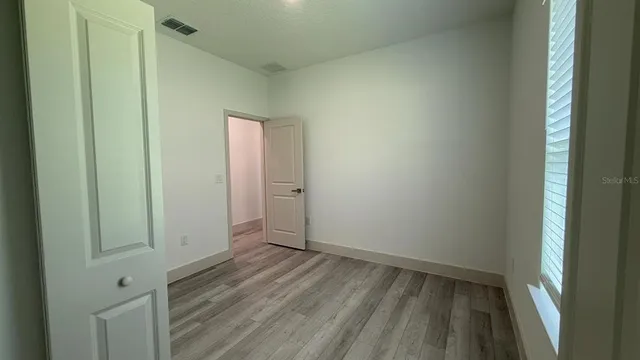 an empty room with closet