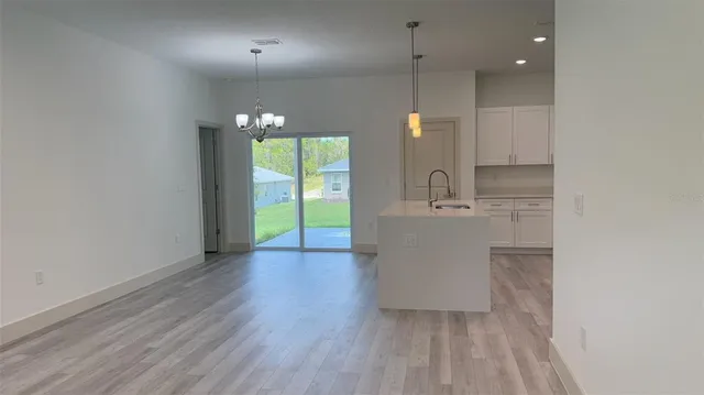 a bathroom with a sink a mirror and a bathtub