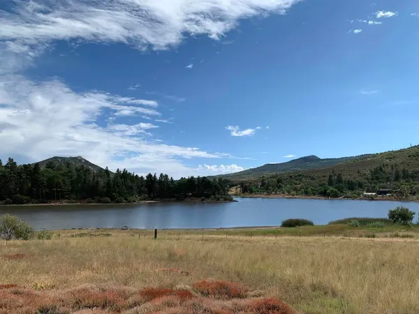a view of lake with mountain