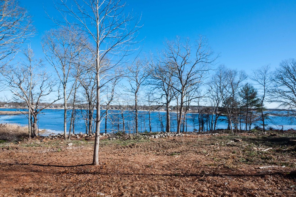 Lot 1 Wareham Road Marion, MA 02738 - Photo 23 of 23 a backyard of a house with large trees