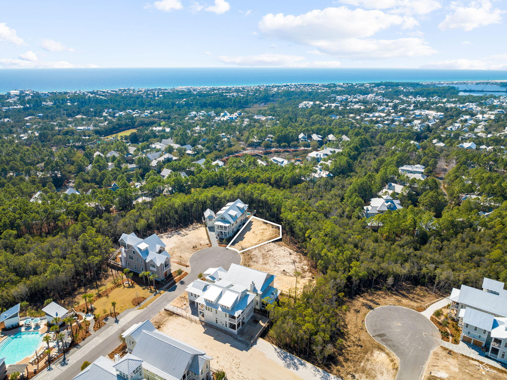 72 String Lily Cove Santa Rosa Beach, FL 32459 - Photo 2 of 26 an aerial view of a city with lots of residential buildings
