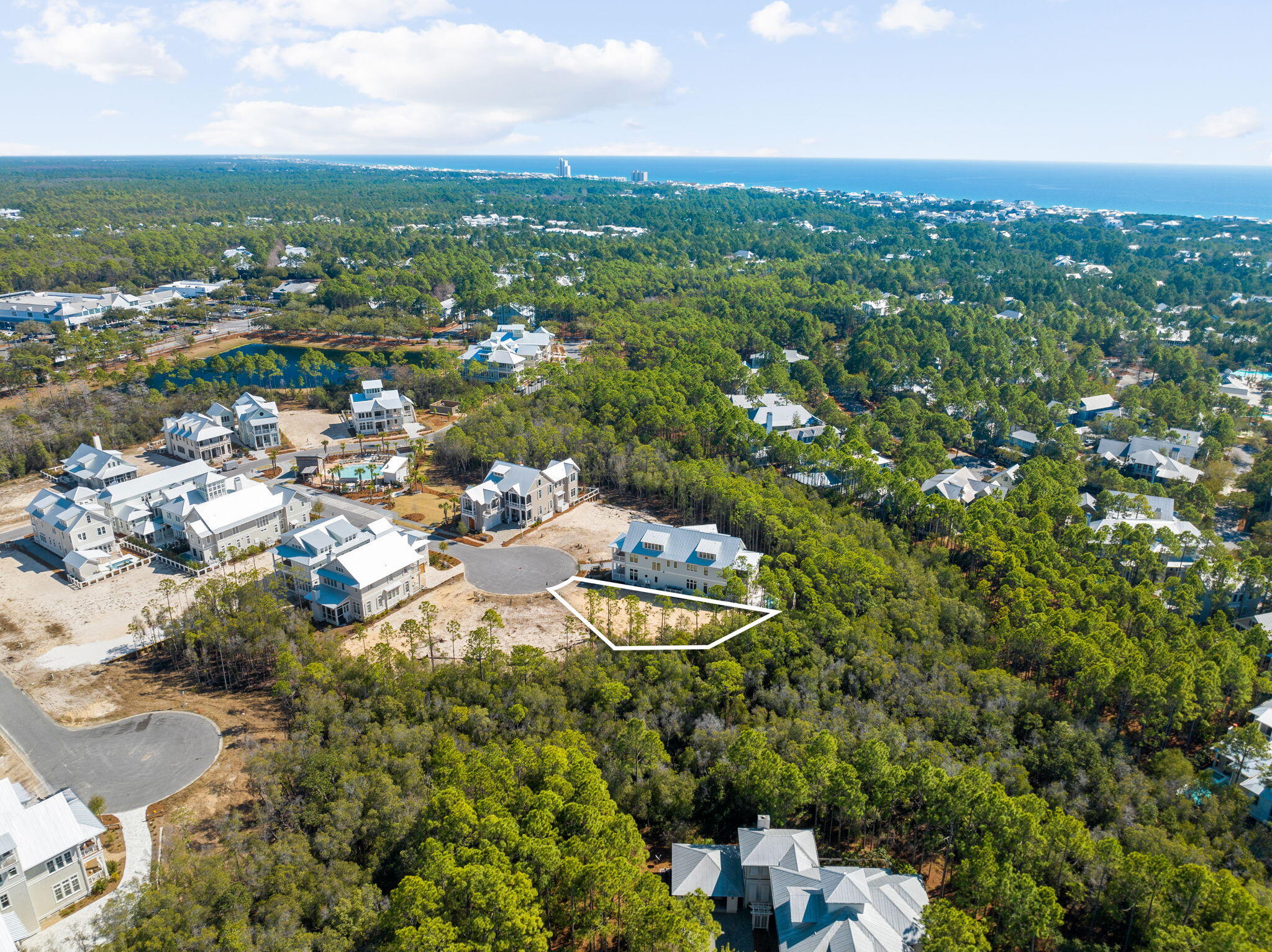 72 String Lily Cove Santa Rosa Beach, FL 32459 - Photo 4 of 26 an aerial view of a city with lots of residential buildings