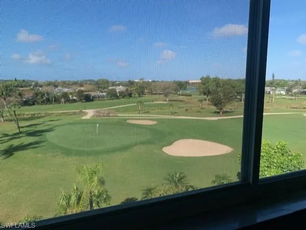 a view of a lake from a window