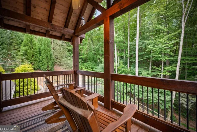 a kitchen with stainless steel appliances granite countertop a stove and a wooden cabinets
