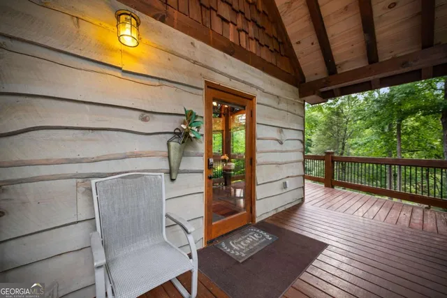 a view of a patio with a table chairs and a patio