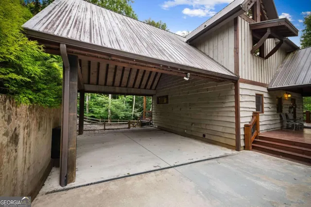 a kitchen with granite countertop a refrigerator stove and sink