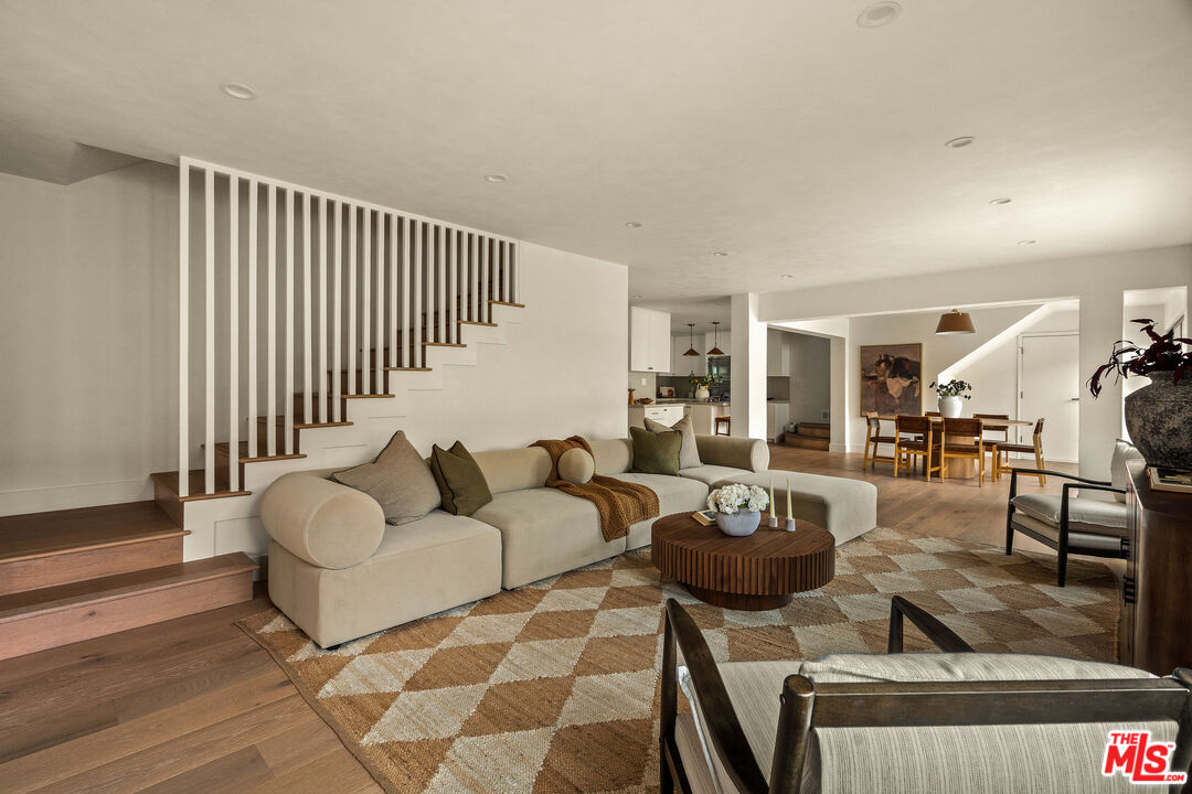 851 Dickson Street Marina del Rey, CA 90292 - Photo 13 of 39 a living room with furniture and a wooden floor