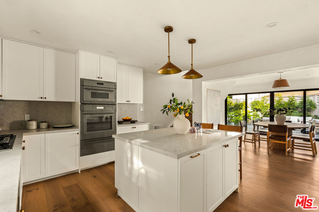 851 Dickson Street Marina del Rey, CA 90292 - Photo 16 of 39 a kitchen with stove and cabinets