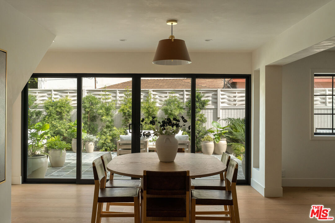 851 Dickson Street Marina del Rey, CA 90292 - Photo 18 of 39 a view of a dining room with furniture and chandelier